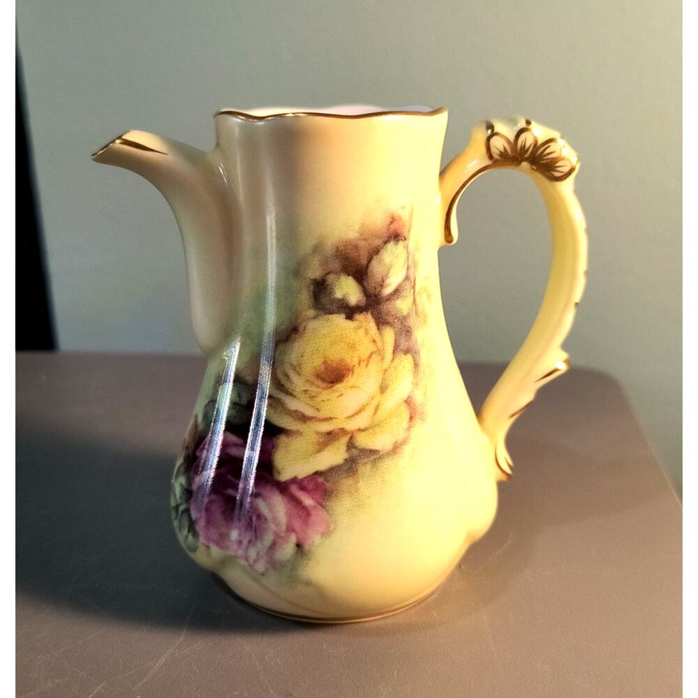 194276.  Mini Floral Tea Pot Cracker Barrel
